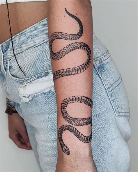 snake wrapped around arm tattoo|50 Best Snake Tattoo Design Ideas & Meaning